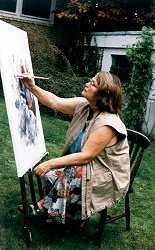  at the easel in her garden